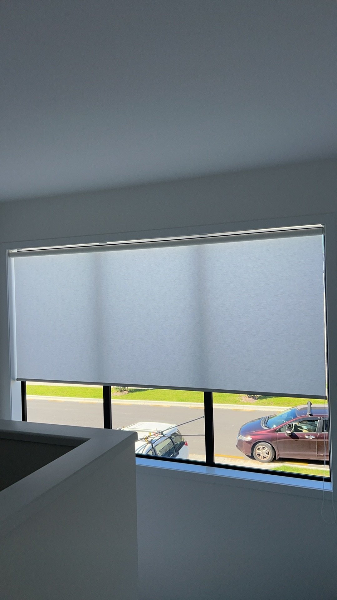 Light filtering roller blind letting soft light through